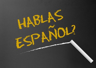 Auf dem Bild ist der Schriftzug "Hablas Espanol?" zu sehen - auf Deutsch: Sprichst du Spanisch?