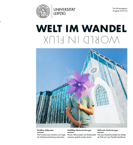 Cover des Jahresmagazins mit Titel, Anreißern und auf dem Foto ein Junge mit einem Windrad in der Hand